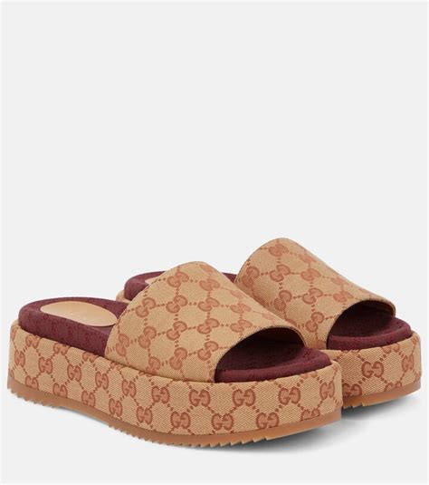 gucci gg canvas platform slides|gucci original slides.